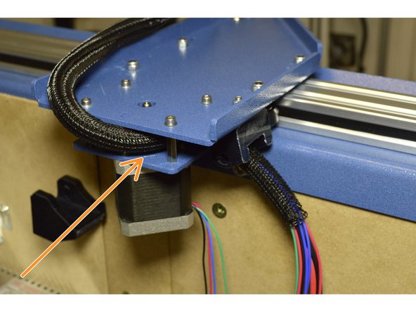 Route the X-Axis Cables through the Left Y-Carriage plate as shown in the picture