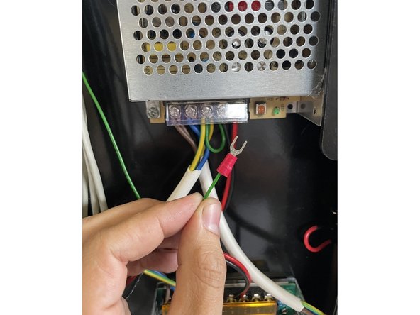 Connect the green ground cable to the earth connection of the 24V power supply. Because the earth connection is bridged to the V- connection, the green earth cable can be connected to the earth connection or the V- connection