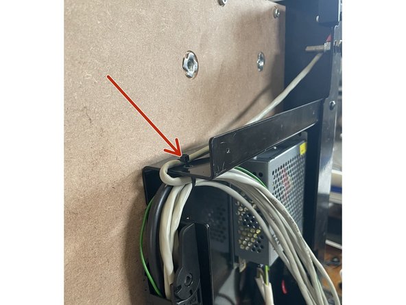 Route the Y Right Motor Cable and the Y-End stop cable through the same gap in the Electronics Assembly as the wires from the drag chain.