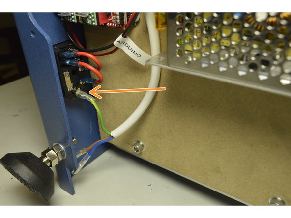 Connect the Green and Yellow cable of the 220V Power Cable to the bottom port on the kettle plug as shown