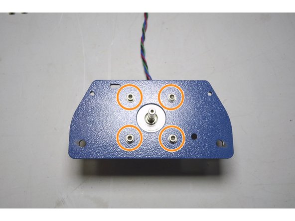 Mount the plate to the motor with the M3x8 cap screws (4 Pcs), M3 Washers (4 Pcs) and Pratley Pratlock