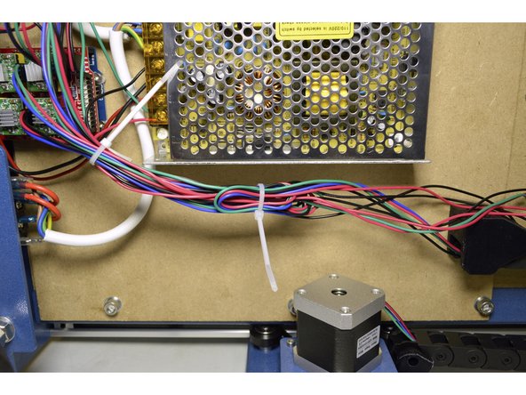 Tie cables down as shown in the pictures