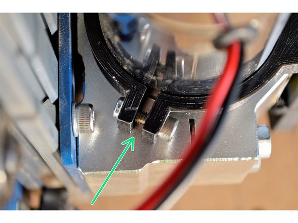 Make sure the bracket hooks onto the spindle bracket at the bottom