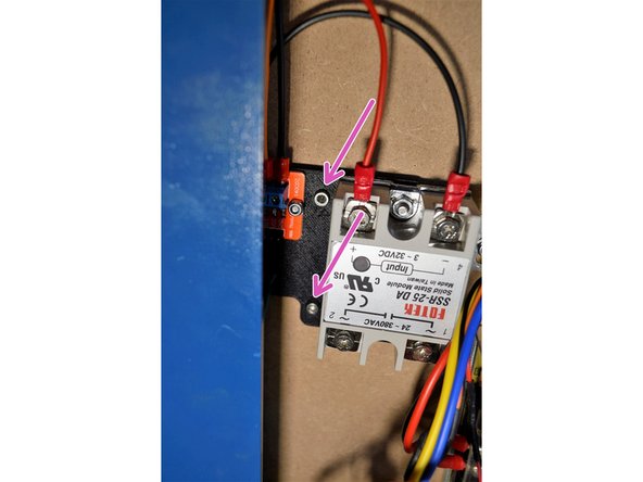 Mount the new relay with the 2 pcs M3x12 cap screws and M3 lock nuts as shown