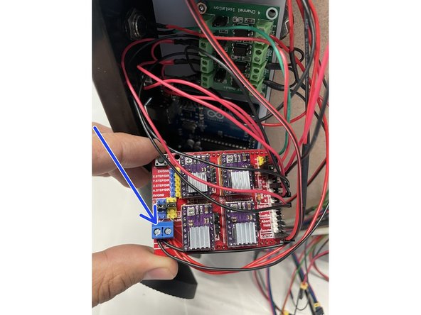 On the bottom left corner of the board is the power connector.  Connect the open ended red &amp; black power cable coming from the 100W power supply to the red &amp; black port respectively.  There are already other wires in that connector, so make sure those wires stay in that connector.