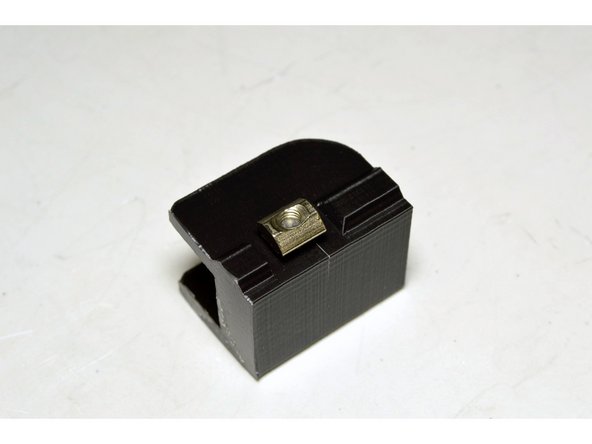 Slide the M5x30 Cap Screw into the hole in the X-Axis Drag Chain Bracket