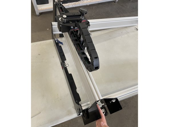 Slide the X-Gantry assembly onto the aluminium profiles and slide it all the way to the Back Plate.