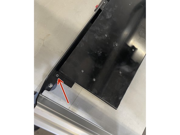 Mount the Electronics Assembly to the back plate with 2 x M5x12 Button head cap screws and 2 x M5 lock nuts as shown in the pictures.