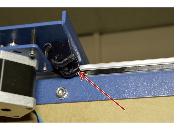 Mount the Y-Drag Chain Carriage Brackets with the M4x16 Cap Screws (2 Pcs) and M4 Lock Nuts (2 Pcs) on the Left and Right Y-Carriage Plates as shown