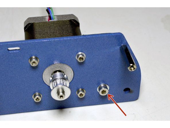 Mount the bracket with the M4x16 cap screw, M4 washer and Pratley Pratlock to the motor plate as shown