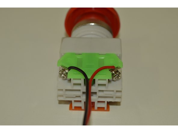 Mount emergency stop cable to emergency stop as illustrated