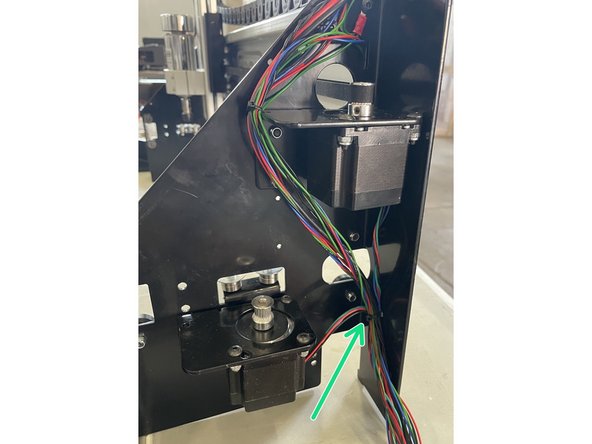 Add the cables of the two stepper motors to the harness and tighten the harness to the back of the right gantry as shown in the pictures.