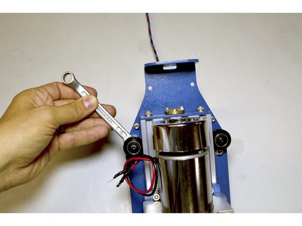 Use the No. 10 Spanner to adjust the preload between the V-Wheels by turning the eccentric nuts on the two left V-Wheels