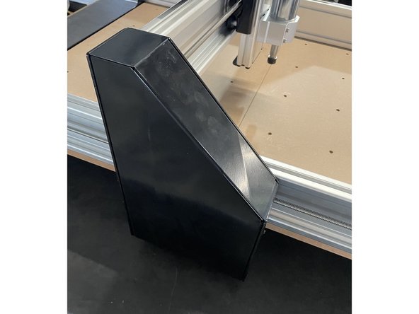 Turn the machine back on its feet and mount the left and the right Gantry Cover Plates back to the left and the right gantries with the screws they were fastened with.  Each cover plate is fastened with 6 x black self tapping screws.