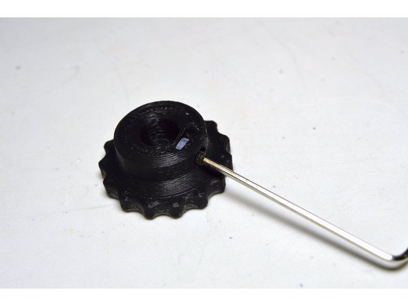 Screw the M3x6 grub screw into the M3 nut with the 1.5mm Allen Key