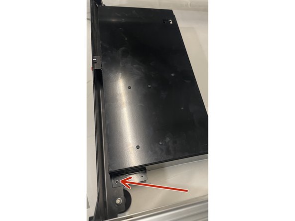 Mount the Electronics Assembly to the back plate with 2 x M5x12 Button head cap screws and 2 x M5 lock nuts as shown in the pictures.