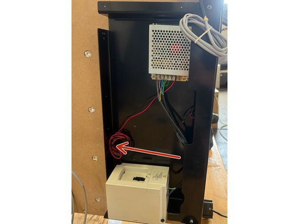 There is a spool of wires tied to the bottom of the Electronics Assembly. Cut the cable tie off with a side cutter and add these wires to the wires coming from the drag chain.