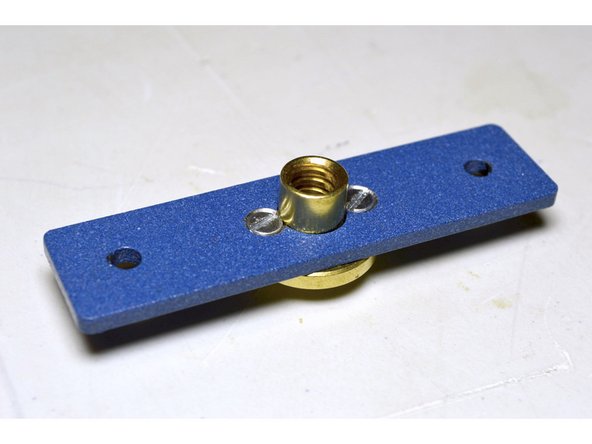 Insert the M3x10 counter sunk screws (2 Pcs) into the two counter sunk holes