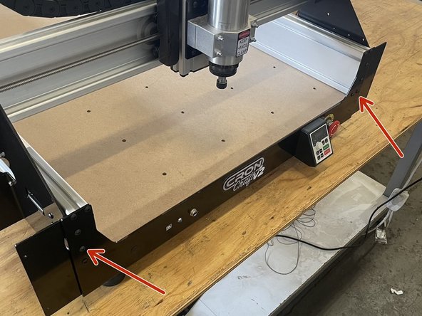 Slide the X-Gantry to the front by turning the Y lead screw simputaniously by hand until the X-Gantry is against the front plate.