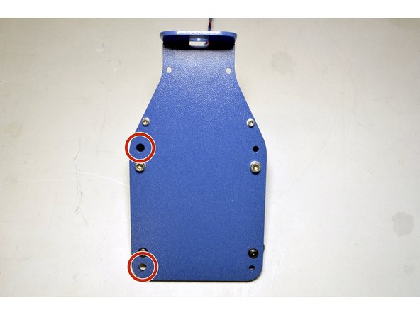 Insert the eccentric nuts in the holes indicated with the notch of the eccentric nut pointing to the left