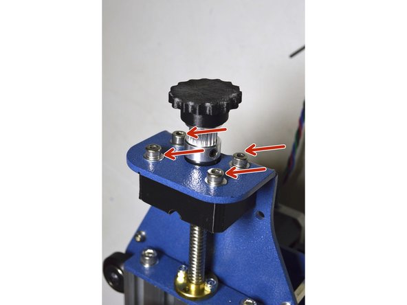 Tighten the M4x20 screws which mounts the bearing block