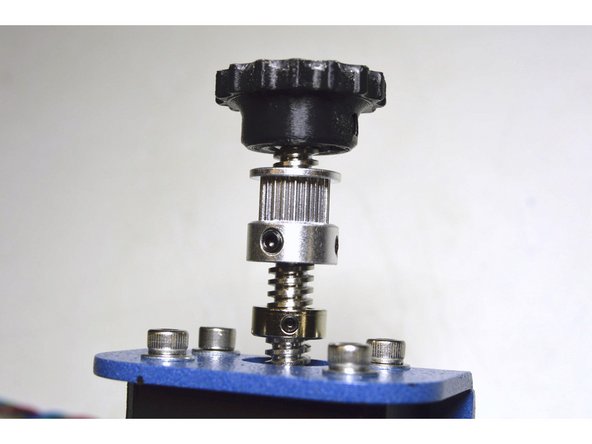 Slide the other 8mm Shaft Sleeve, GT2 Pulley and Z-Knob onto the lead screw