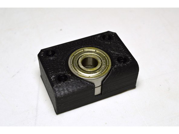 Insert the 608 bearings (2 Pcs) into the printed bearing block