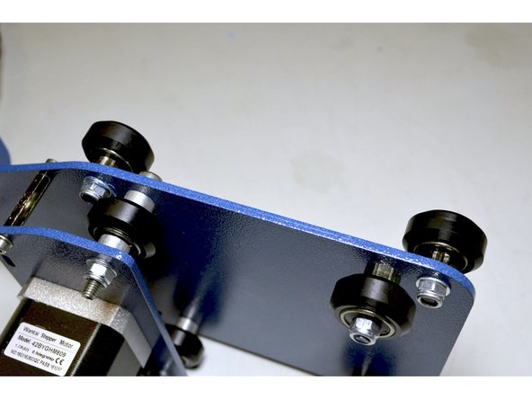 Tighten the V-Wheels with the No. 8 Spanner and the 3mm Allen Key