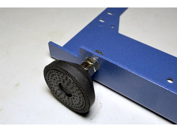 Tighten the feet with the No.13 and No. 14 Spanners