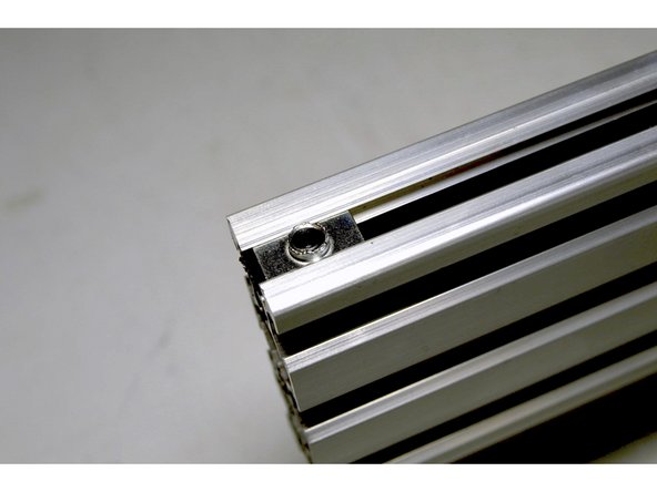 Tension the belt and fix the other side