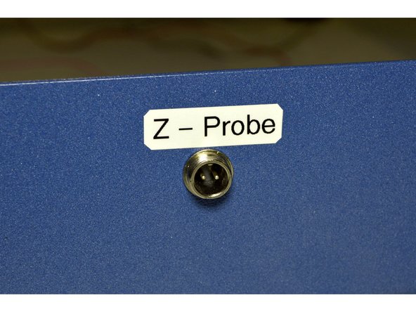 Remove the nut and washer from the GX12 connector