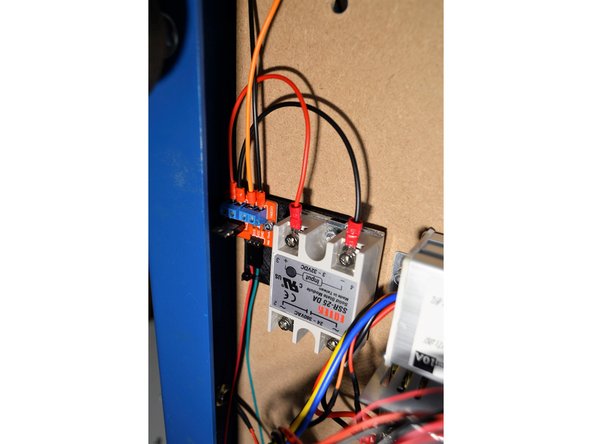 Mount the new relay with the 2 pcs M3x12 cap screws and M3 lock nuts as shown