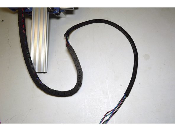 Slide the webbing over the cables