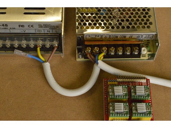 The Brown cable goes to L, the Blue cable goes to N and the Yellow and Green cable goes to Ground.