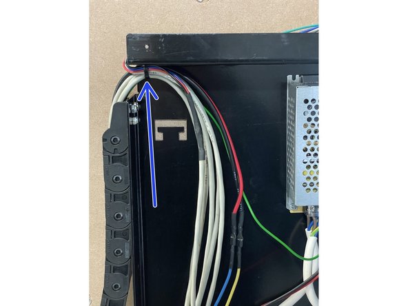Use a 2.5mm cable tie to tie the cables to the Electronics Assembly Base Plate through the holes provided.