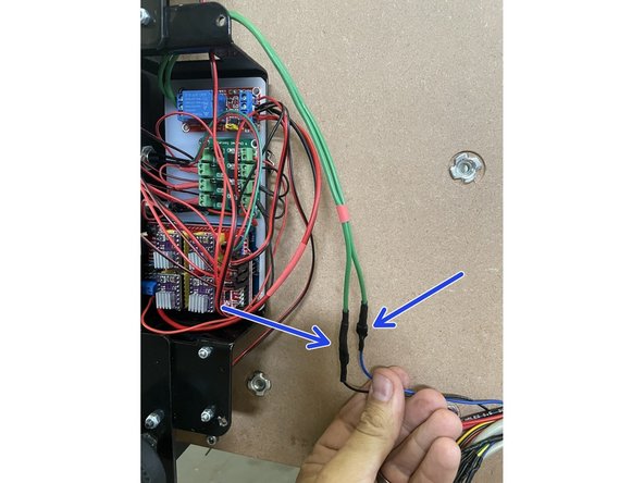 Connect the blue and black cables with the spade connector to the green cables coming from the relay. The male and female connectors will show you which one is connected to which.