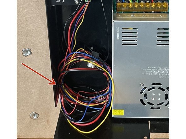 There is a spool of wires tied to the bottom of the Electronics Assembly. Cut the cable tie off with a side cutter and add these wires to the wires coming from the drag chain.