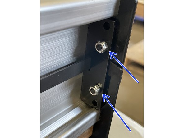 Pull the end of the belt with sharp nose pliers to tension the belt while you tighten the screws so that you tension the belt.