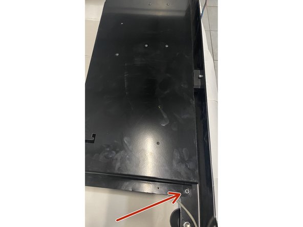 Mount the Electronics Assembly to the back plate with 2 x M5x12 Button head cap screws and 2 x M5 lock nuts as shown in the pictures.