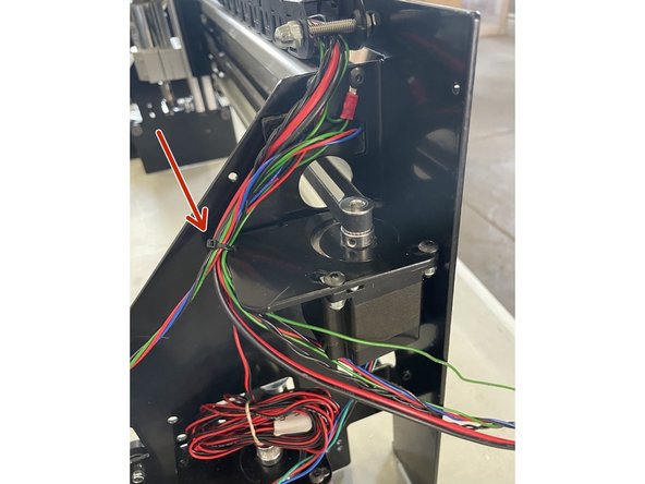 Route the cables through the right gantry as shown in the pictures.  First tighten them with a cable tie to the top motor bracket.