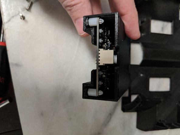 Insert them from the bottom of the board into the 4 corners of the motor driver as shown in Pic 2.