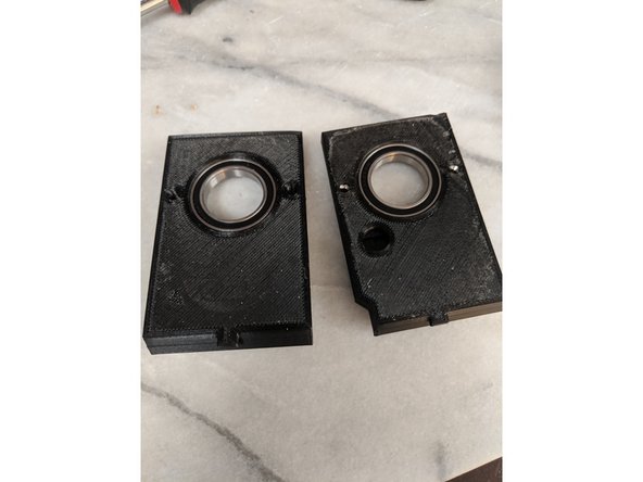 Next you will insert the 6805 bearings into the frame inserts.