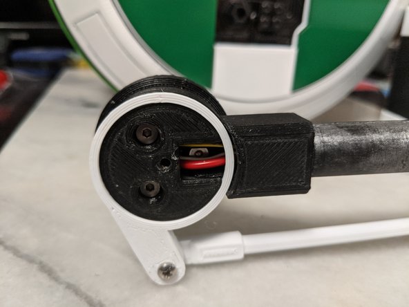 Insert the 3 M3 x 35mm long countersunk screws through the 3 holes to hold the MainBarHolderB print in place as shown in Pic 3.