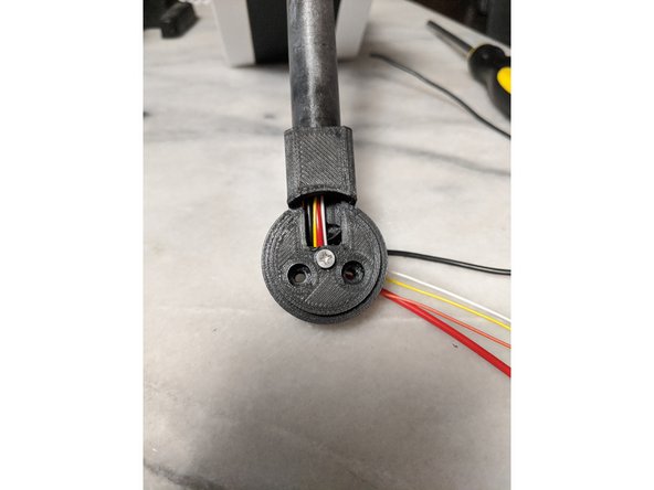 Screw the 8mm long M3 screw into the MainBarHolderA print until just barely tight.  Do not over tighten this screw.