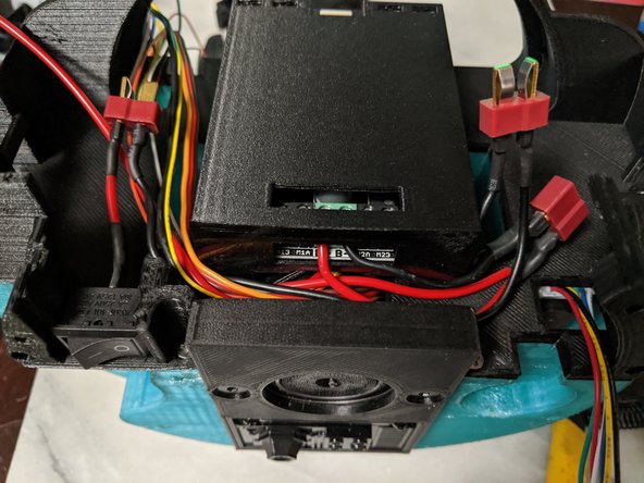 Strip the ends of the two final power wires, and they will attach to the center screw terminals on the motor driver.