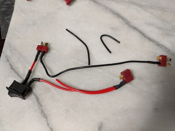 Attach the other end of the 160mm wire to the other male connector that has no wires attached.  Connect this wire to the POSITIVE terminal (we are wiring these batteries in series), it is correct as shown in Pic 3.