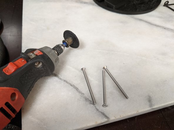 Here you will want a dremel with a cutting wheel and 3 M3 x 30mm (or longer if you choose) screws.
