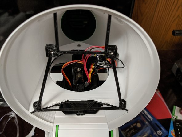 We will now install the RearFrame print into the head.  For this I used 2 M3 x 8mm screws and they threaded into the bracket on the head and HeadPlate bracket as well.