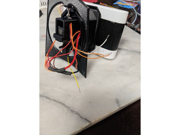 Here we will strip all the orange signal wires on the servos, and the other 3 wires going to the body.  I have white, yellow, and orange that I used.