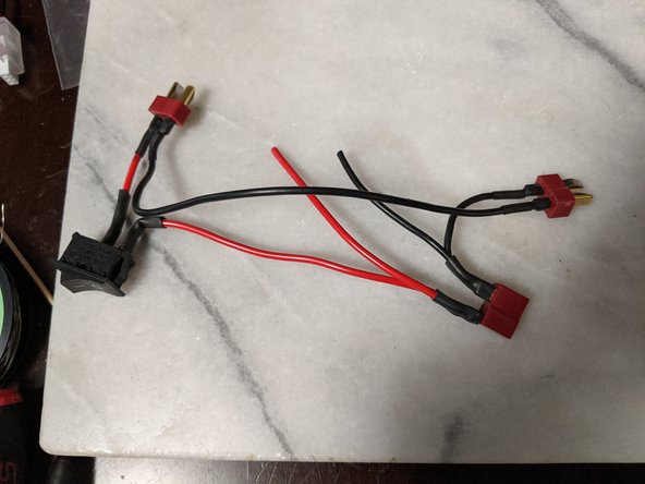 Finally attach the other end of the 40mm long wire to the ground leg of the other male connector as seen in Pic 2.